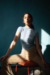 a woman sitting on a chair